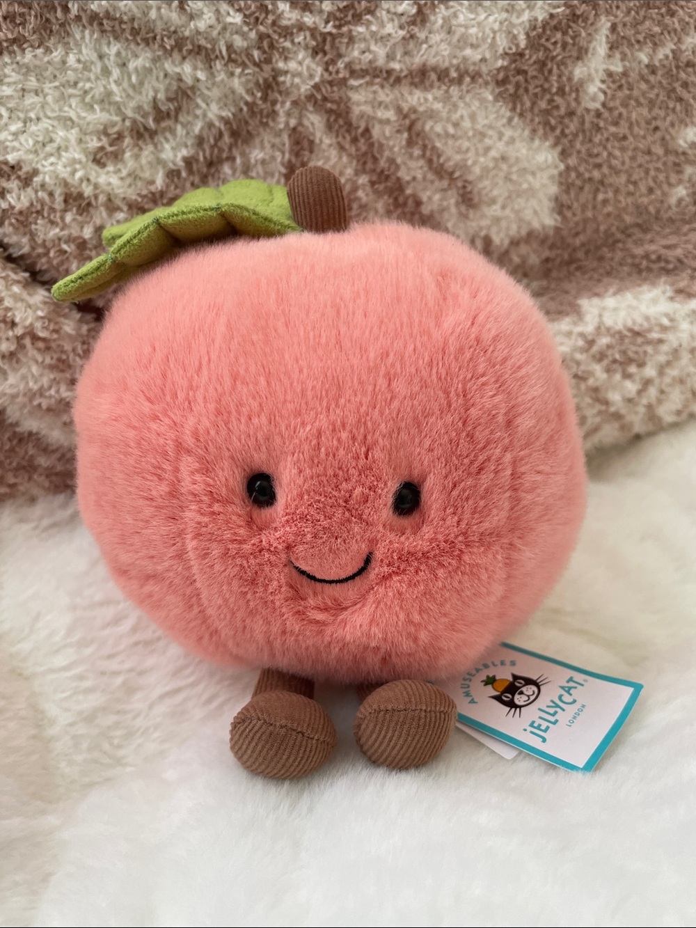Jellycat Peach Plush in Coral Pink with Green Leaf